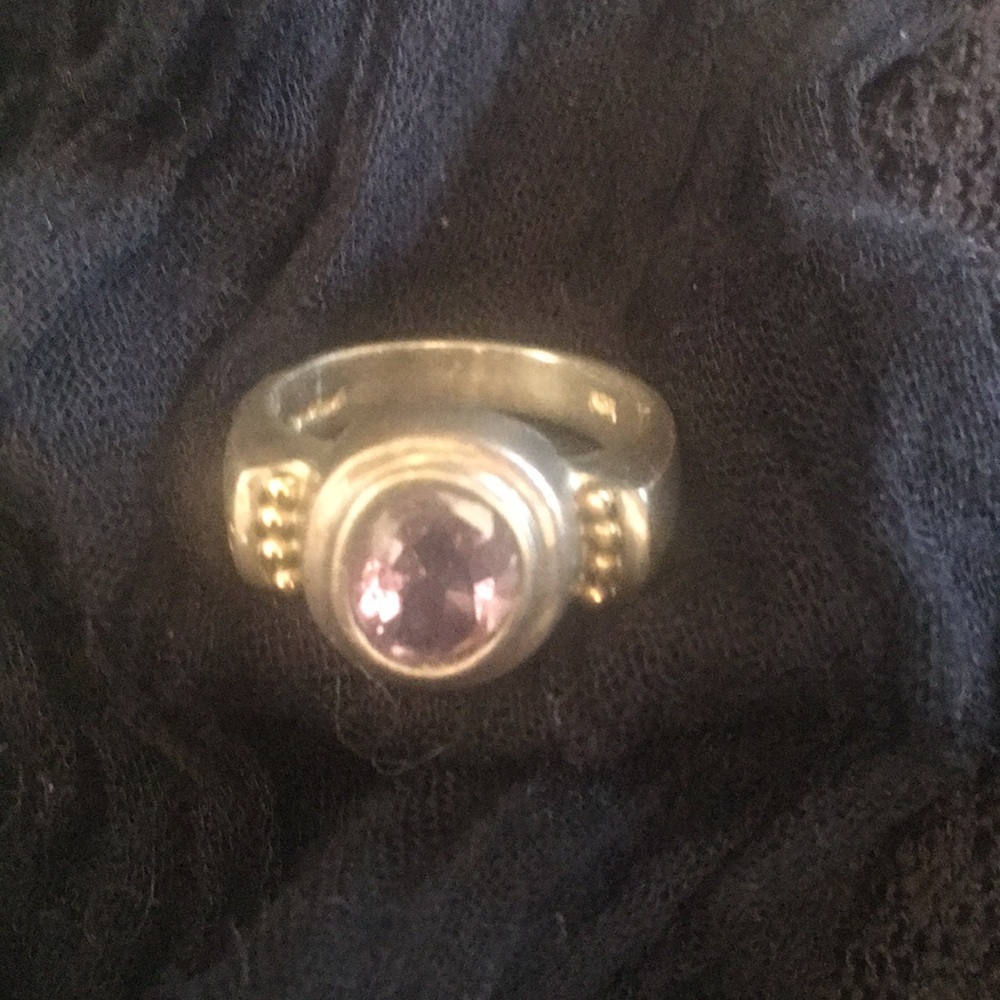 Amethyst and silver ring with gold beads.